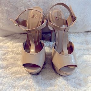 Nude platform heels